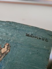 Painted on drift wood of monk and doves