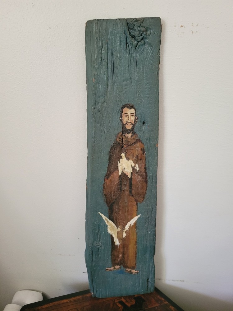 Painted on drift wood of monk and doves